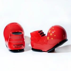 Alcancía en forma de bota roja con detalles de circo alcancía bota de cerámica