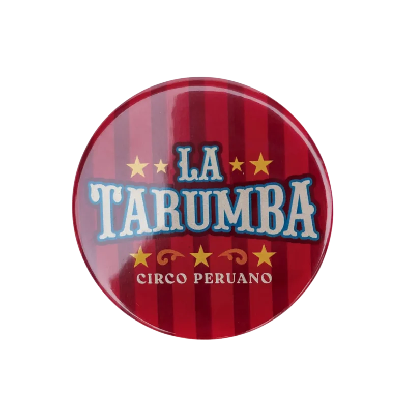 Pin botón de La Tarumba con diseño colorido y texto destacado pin botón tarumba